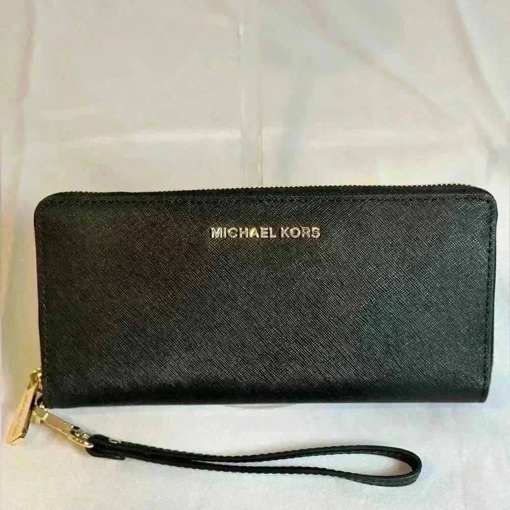 NWT! Jet Set Travel Continental Wallet Black with strap and gold accents